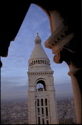 The Sacre Coeur belltower as seen from the main spire. Paris, France.