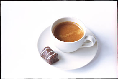 Cup of espresso with M&S chocolate.