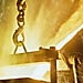 Molten iron pouring into holding vessel in Swedish foundry.