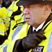 Police officers bringing up the rear of the parade. Chinese New Year 2006, London.