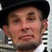 In Millenium Park, this Abraham Lincoln impersonator posed for photos for tourists.