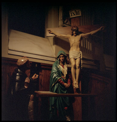 A crucifix and madonna shot on Lubitel 166 in Assumption Church, Chicago.