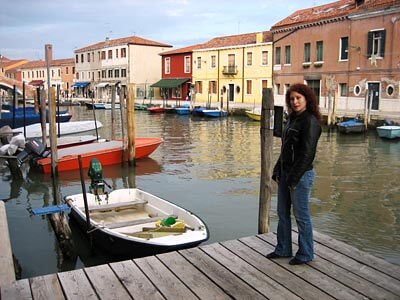 My wife Lauri on a small pier in Murano.
