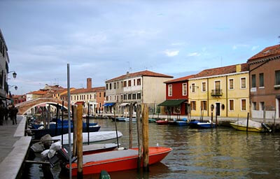 A canal in Murano near Venice, Italy. I love the colorful houses and the water.