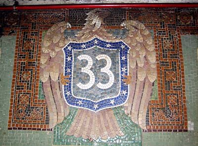 A mosaic showing the station number in the New York subway.