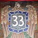 A mosaic showing the station number in the New York subway.
