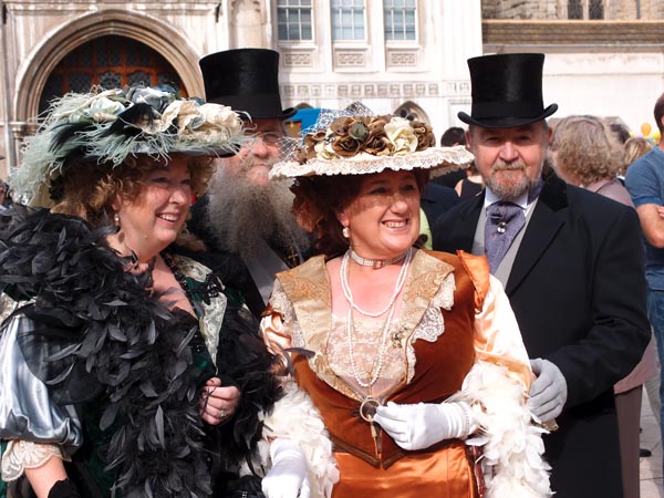 Two ladies and a gentleman at the 2011 Costermongers Festival in London.