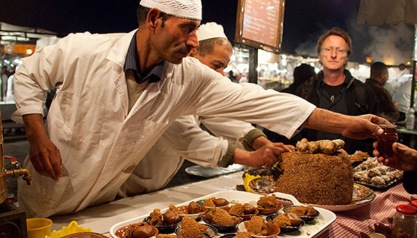 Vendor selling tea in a Marrakesh market