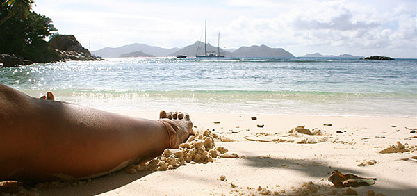 Relaxing on a beach in the Seychelles