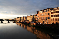 The river through Florence, Italy - photo by jonrawlinson