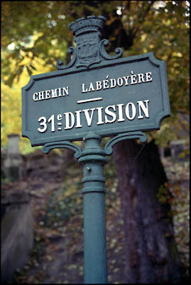 Road sign in the Cimetiere Montmartre, Paris.