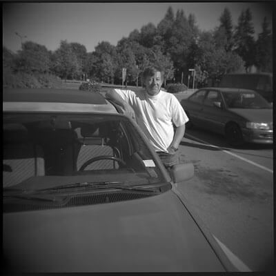 My dad by the car, on our way to Grandma's.