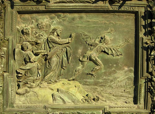 A detail of Jesus banishing a devil on the Catedral di San Zeno door, Pisa, Italy.