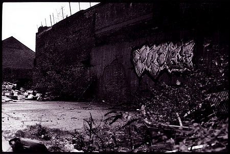 Graffiti on wall in London's East End near Brick Lane. Used my Voigtlander camera for this shot.