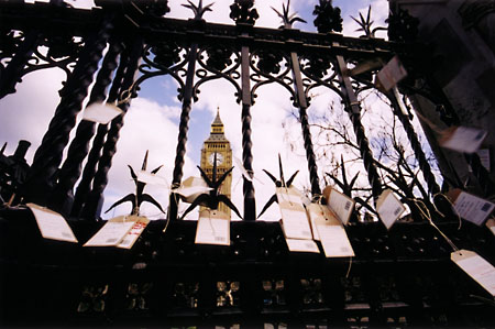 Demonstration against top-up fees, posters/price tags on fence around Houses of Parliament.