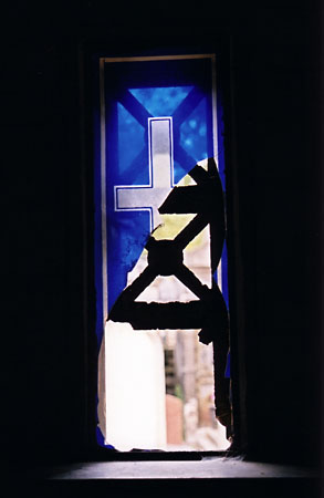 Broken glass window, Cemetiere de Montmartre, Paris.